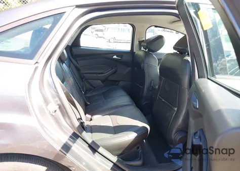 2014 Ford Focus Se z USA, uszkodzony, nr VIN 1FADP3F27EL411799